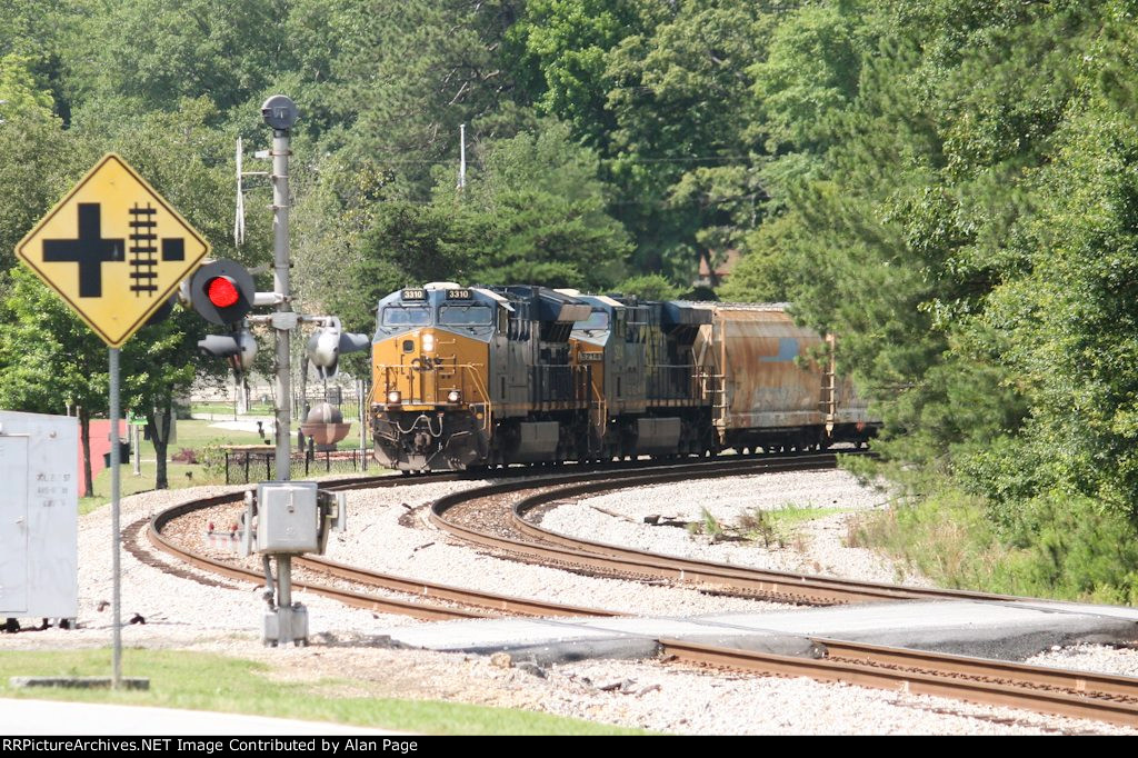 CSX 3310 and 5214 round the curve
